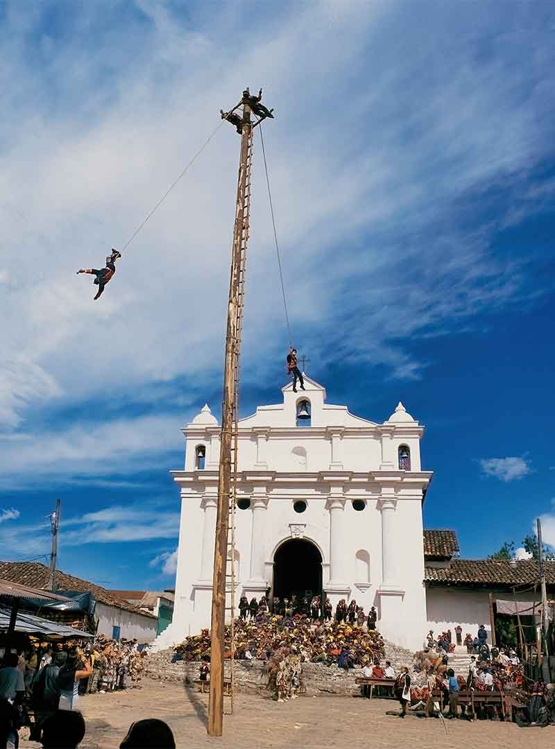 Fotography of El Palo Volador of Chichicastenango, a unique Cultural Trip Experience in Guatemala.